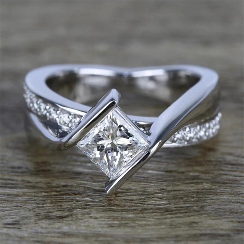 925 Sterling Silver Princess Cut CZ Twist Halo Ring 1