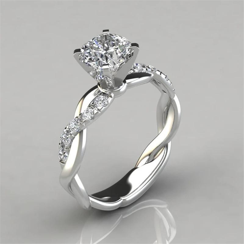 925 Sterling Silver Round Cut Created CZ Twist Halo Ring 3