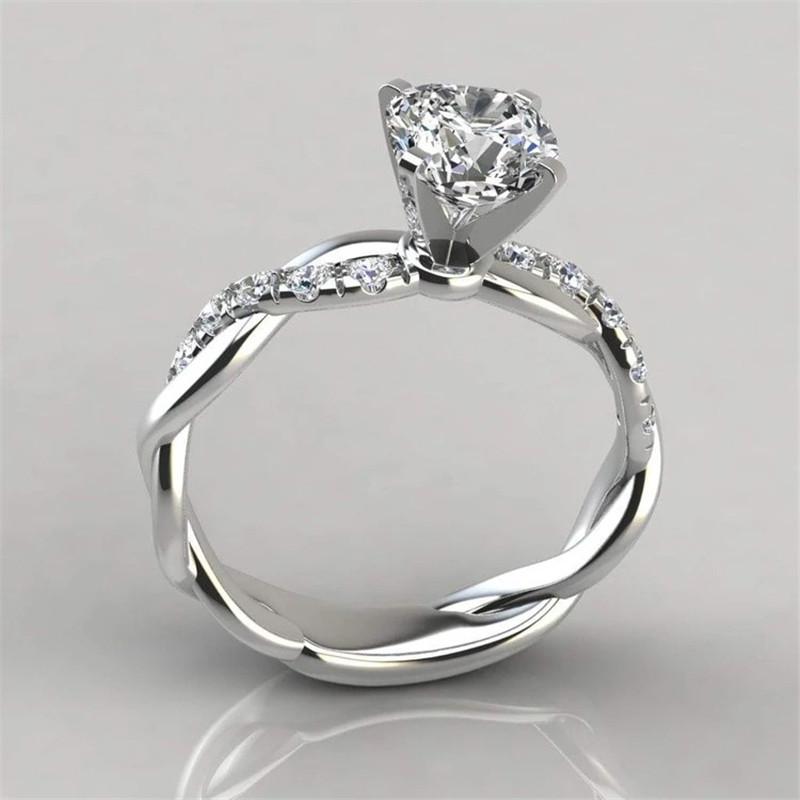 925 Sterling Silver Round Cut Created CZ Twist Halo Ring 4